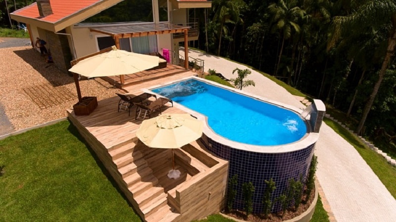 multi level backyard pool with deck