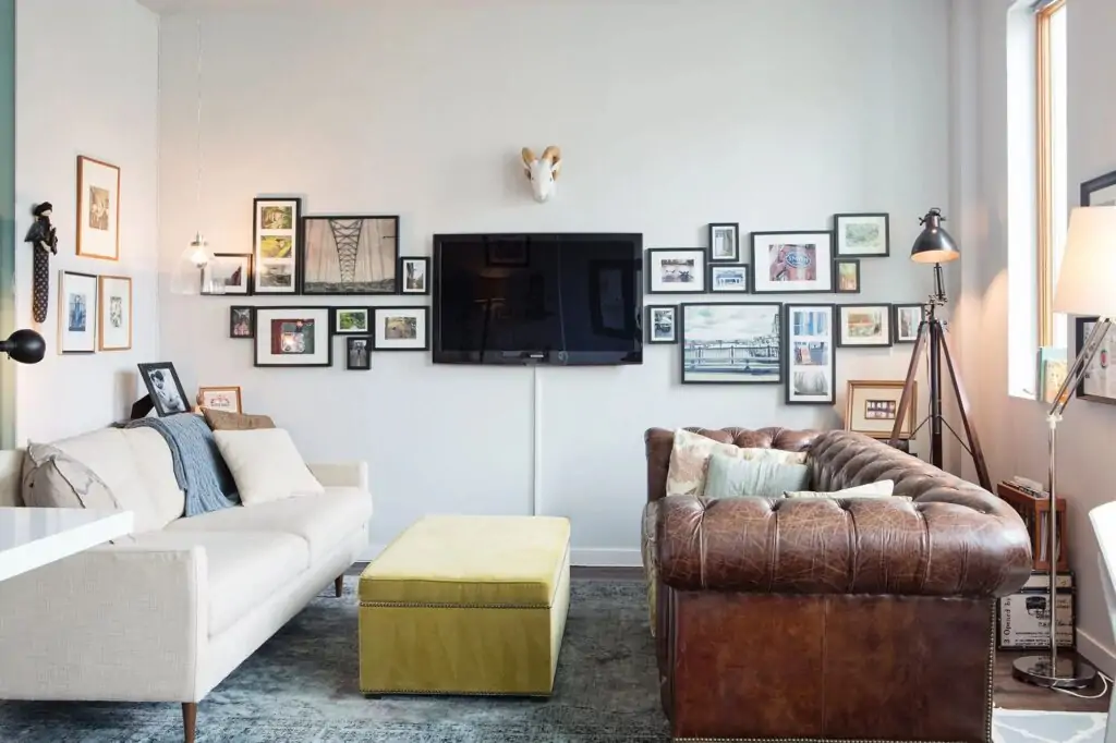how to arrange photo and tv on accent wall