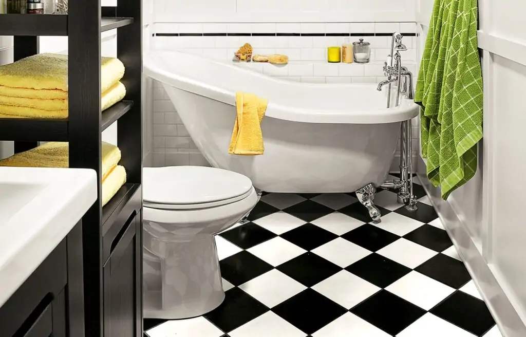 Checkerboard tiles installed diagonally in a shower room