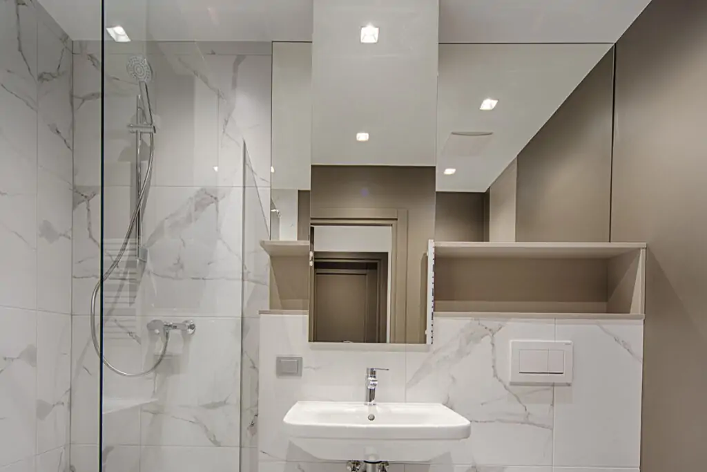 Receesed ceiling light in a shower room