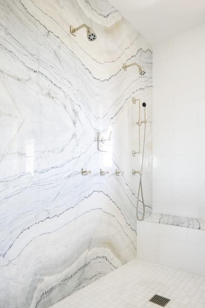 Classy wet room with a minimalist shower head