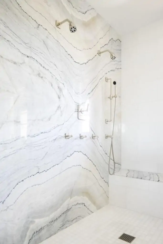 Classy wet room with a minimalist shower head