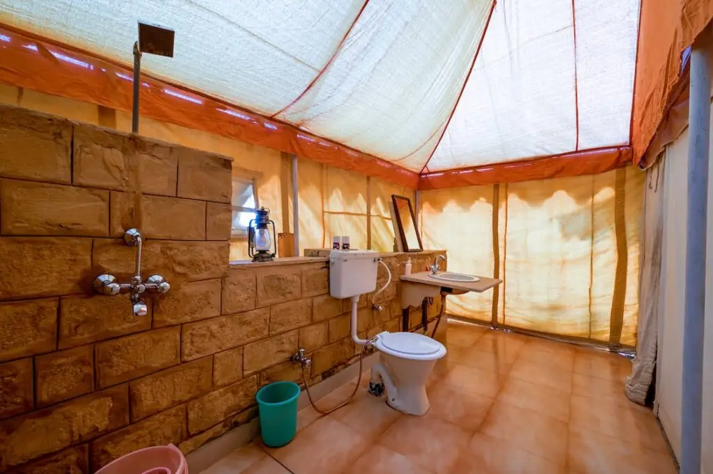 Bold Yellow This is obviously a makeshift bathroom but the right choice of yellow can still give it style and make it seem even more spacious and impressive