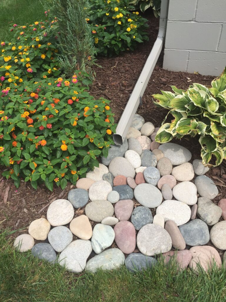 gutter drain ideas simple stones