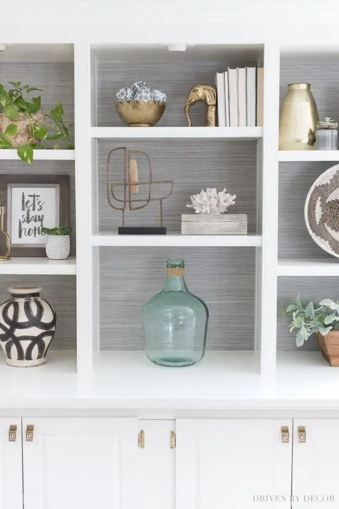 bookshelf with different accessories