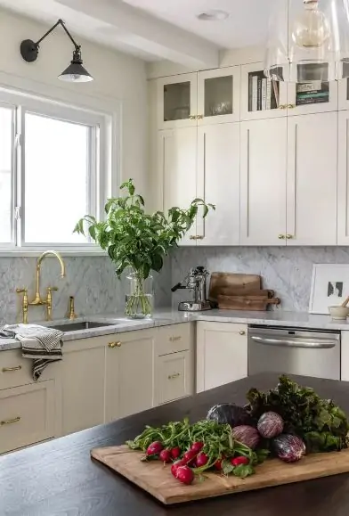 storage above the cabinets with glass doors