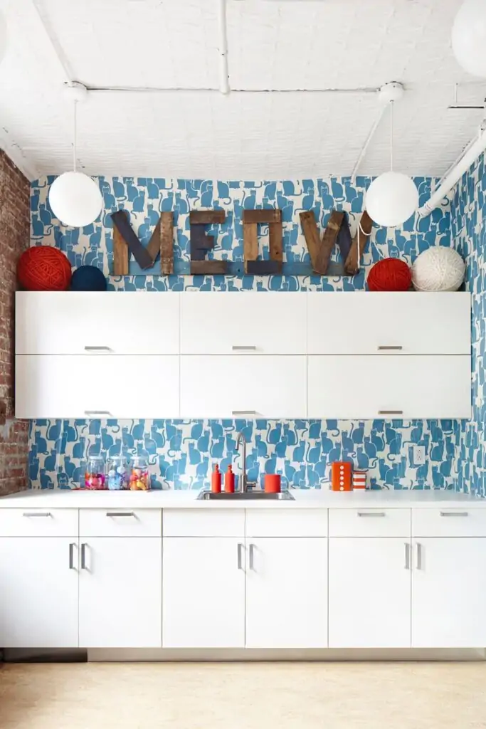 wallpaper above kitchen cabinets