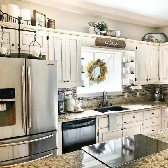 storage above the cabinets in farmstyled kitchen