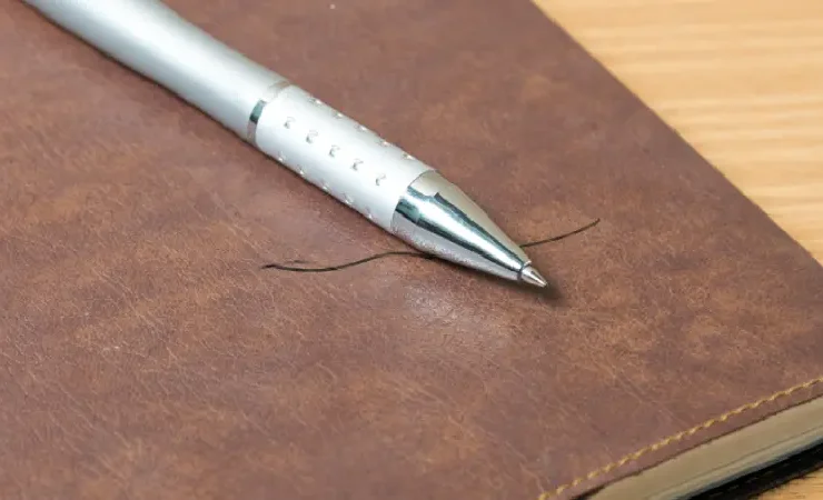 remove ink from leather