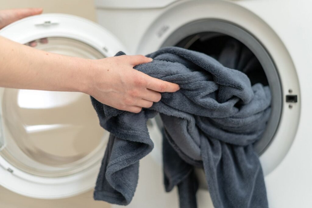 loading weighted blanket into washing machine