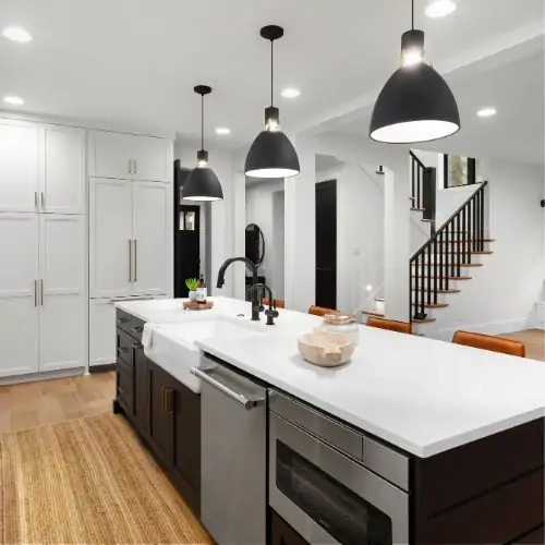 beautiful white kitchen with chocolate island cabinets