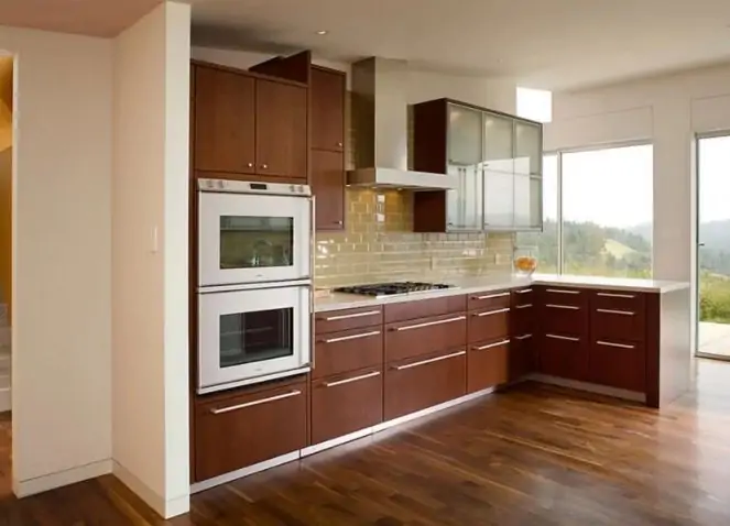 Simple brown kitchen cabinets with modern elements