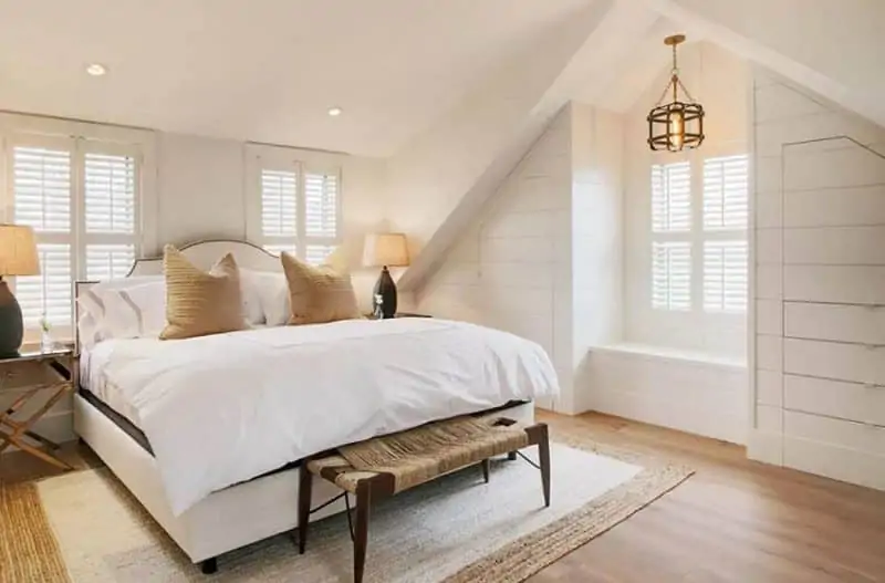 white bedroom with banches