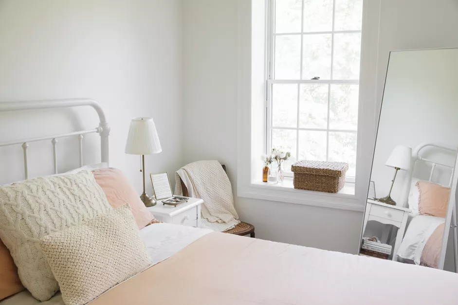 mirror on the floor facing the bed