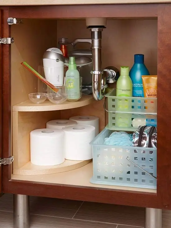 Multi tiered storage cabinet with a curved shape