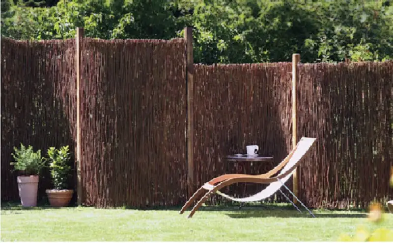 7 Creative Tree Branch Fence Ideas For Your Outdoor Space