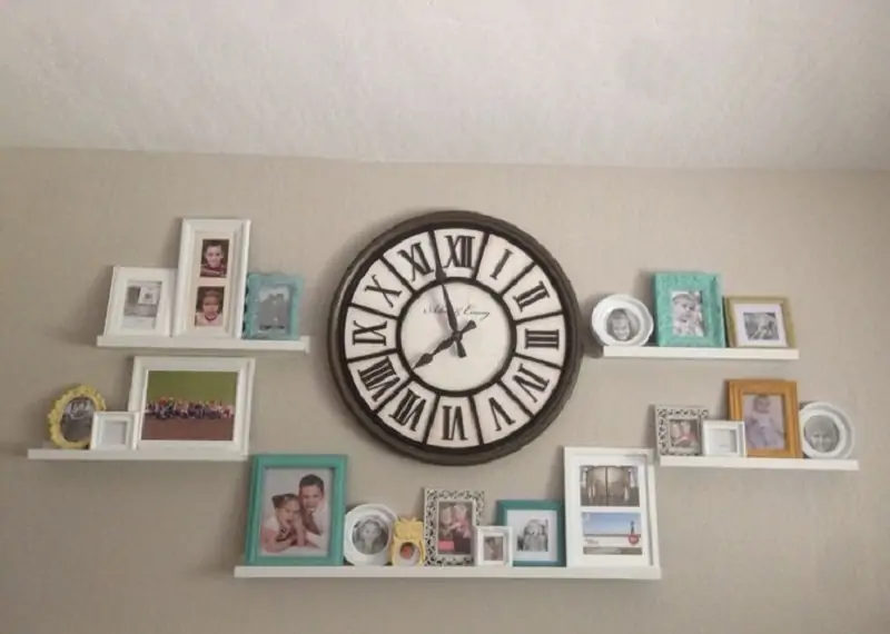 photo frames around a wall clock