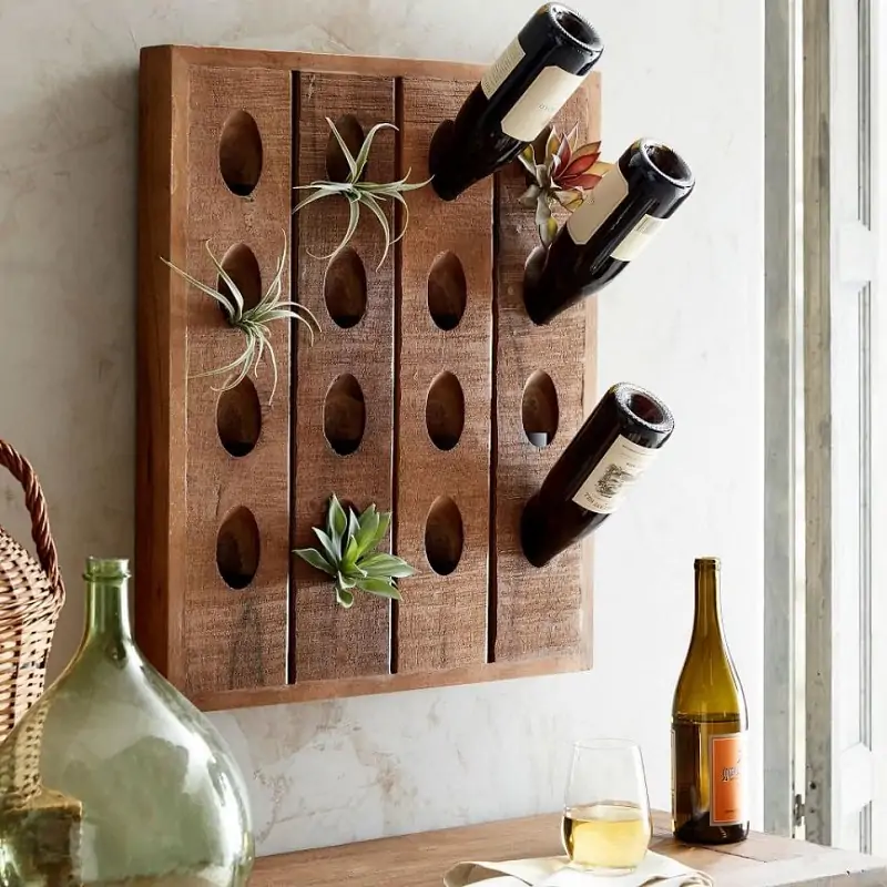 wooden riddlin wine rack for storing wine bottles