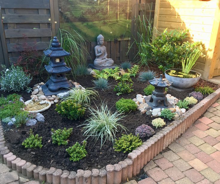 simple zen garden with buddha statue